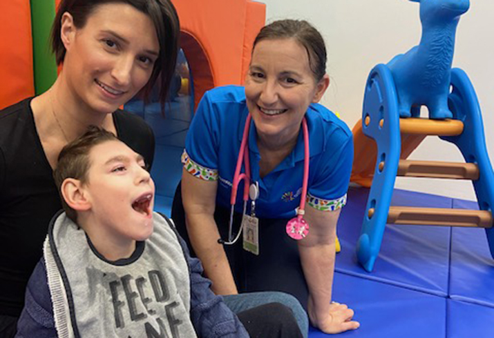 Jo and Ashton Vernon with physiotherapist Dr Noula Gibson